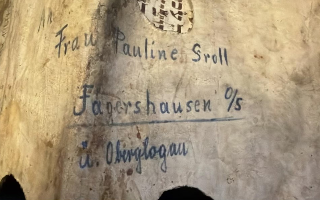 Norwegian auction of Nazi-defaced Holocaust-era Torah fragment sparks outcry, then intervention — Times of Israel